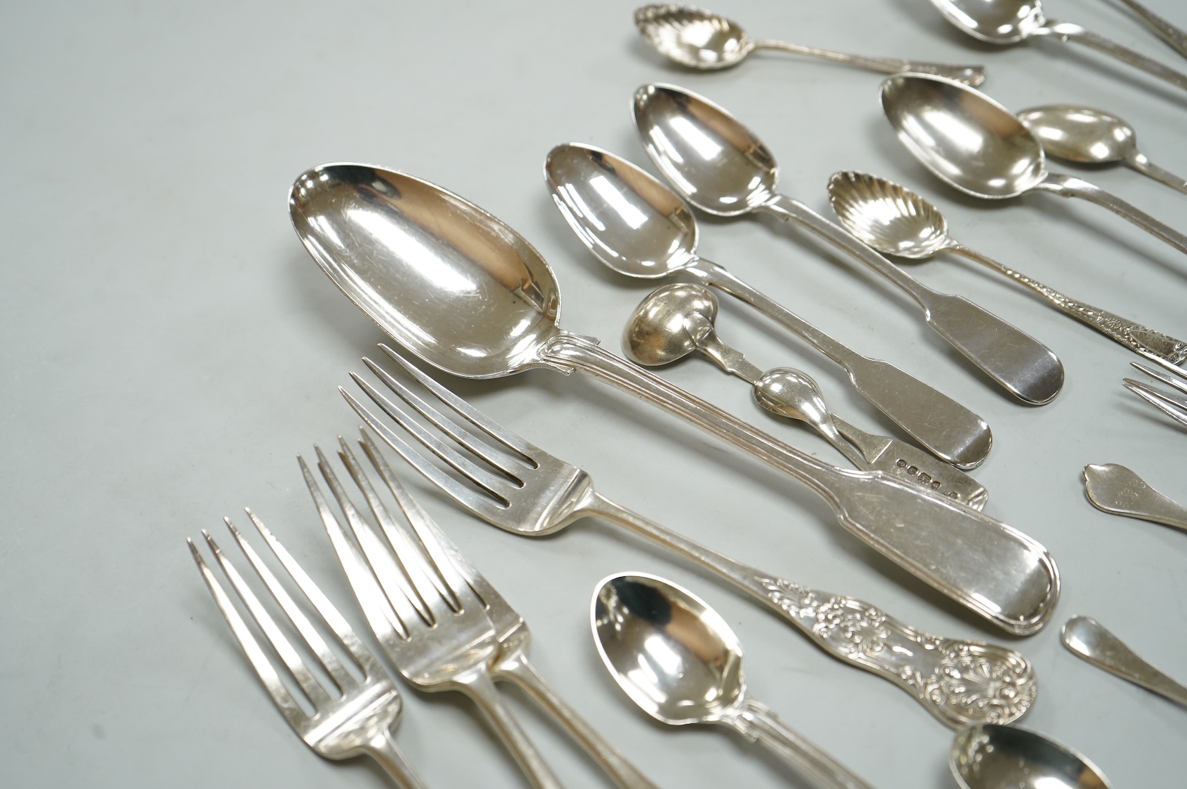 A collection of assorted Victorian and later silver flatware, various patterns, dates and makers, 17.2oz.